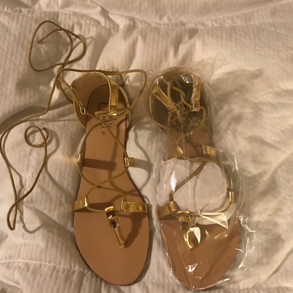New gold gladiator tie up flat sandal size 10